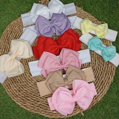 Diademas con lazos de colores en diferentes tamaños